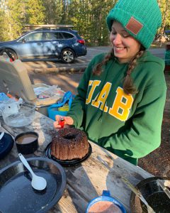 eating birthday cake at the campsite