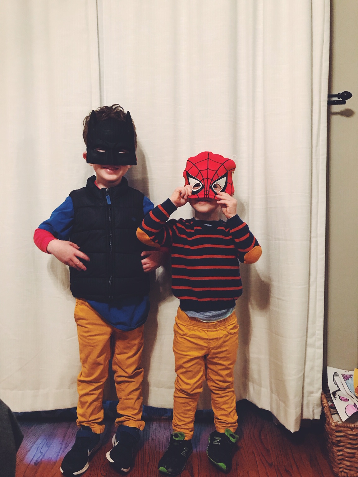 two boys in masks