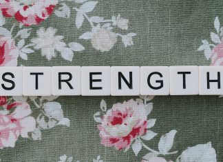 Word, Strength" on a floral fabric background