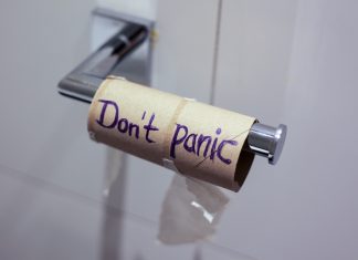 Toilet paper roll with "Don't panic"