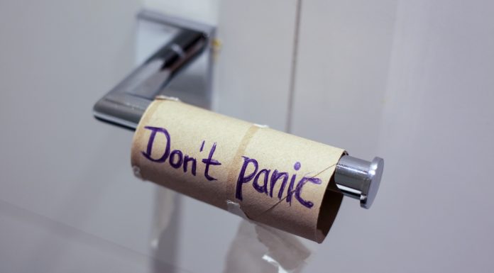 Toilet paper roll with "Don't panic"